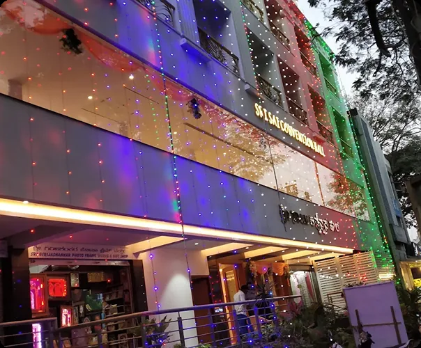 The building lit in colour for a celebration